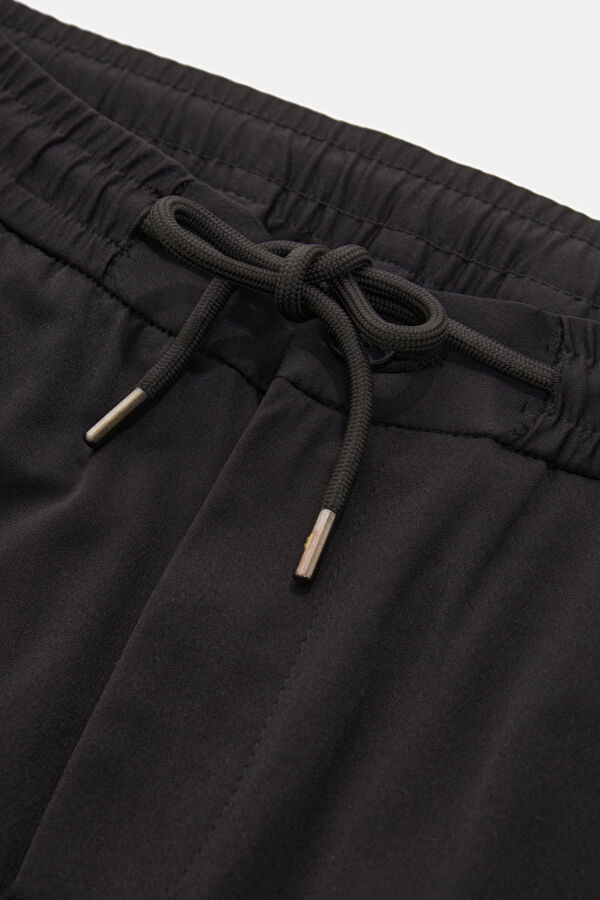 SİYAH BORU PAÇA JOGGER SPOR PANTOLON 3